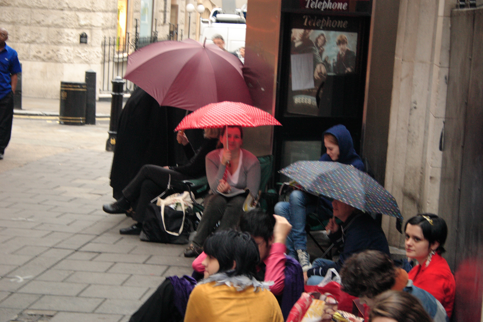 People queueing up for the Harry Potter book launch in London, those umbrellas would come in useful later on when it really rained heavily!