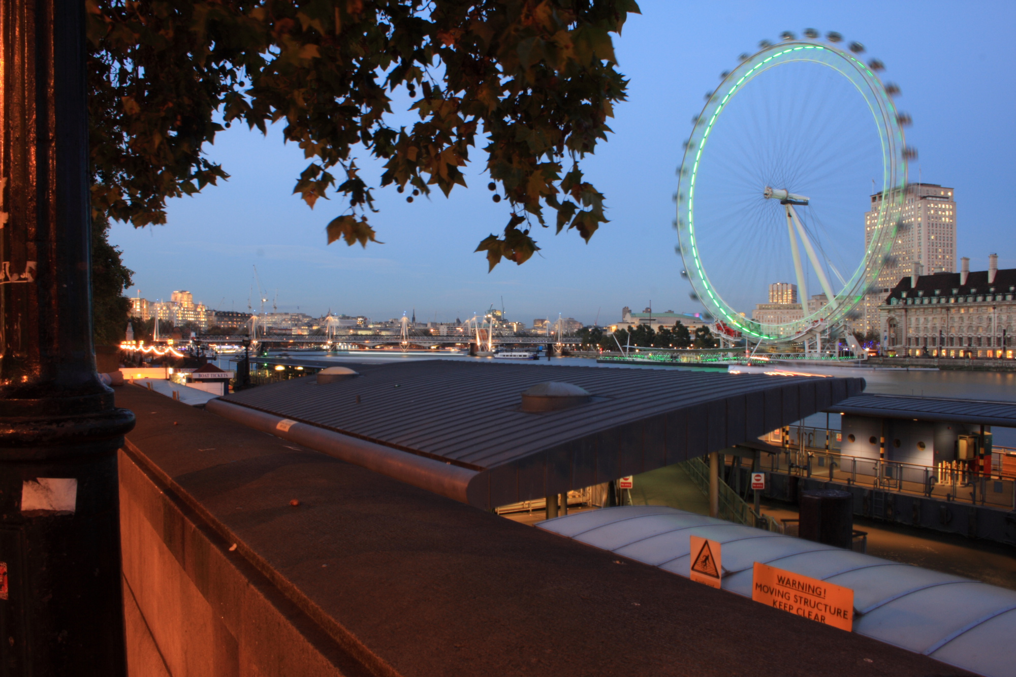 London Eye and the Thames at dusk.