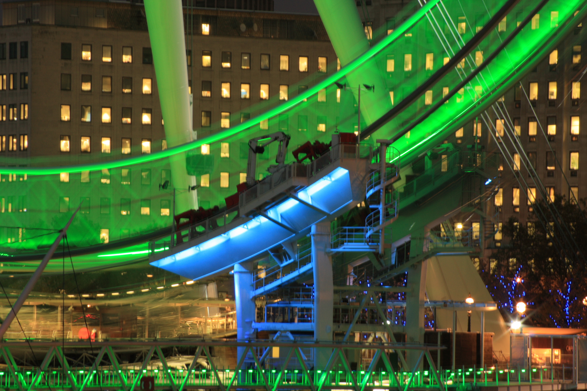 London Eye at night spinning.